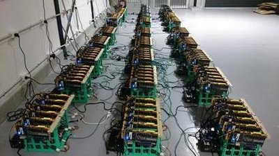 Modern mining farm hosting multiple cryptocurrency miners, including Kaspa and BTC machines