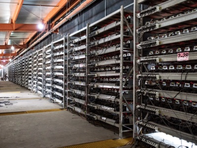 Large scale hosted Bitcoin mining farm with climate-controlled racks